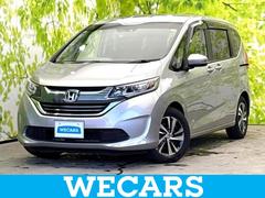 フリードハイブリッド ハイブリッドGホンダセンシング 新品タイヤ/純正 9インチ メモリーナビ/フリップダウンモニター 純正 11インチ/ホンダセンシング/両側電動スライドドア/車線逸脱防止支援システム/ドライブレコーダー 社外 衝突被害軽減システム 中古車画像