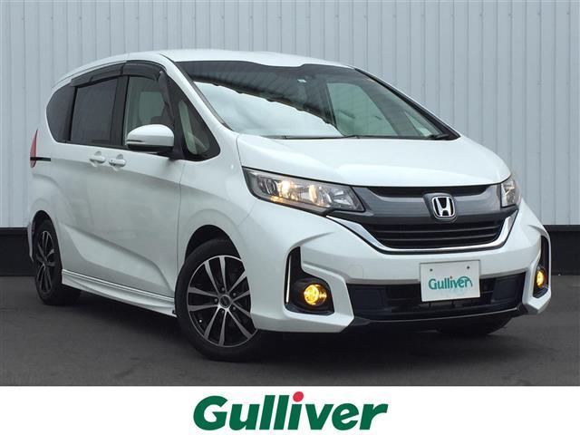 フリード ホンダ ｇ ホンダセンシング ストラーダナビ ホンダセンシング 衝突被害軽減 追従クルコン レーンキープアシスト 両側電動スライドドア バックカメラ ビルトインｅｔｃ 純正レザー調シートカバー ｌｅｄ付きフロント エアロバンパー 岡山県 ｇ