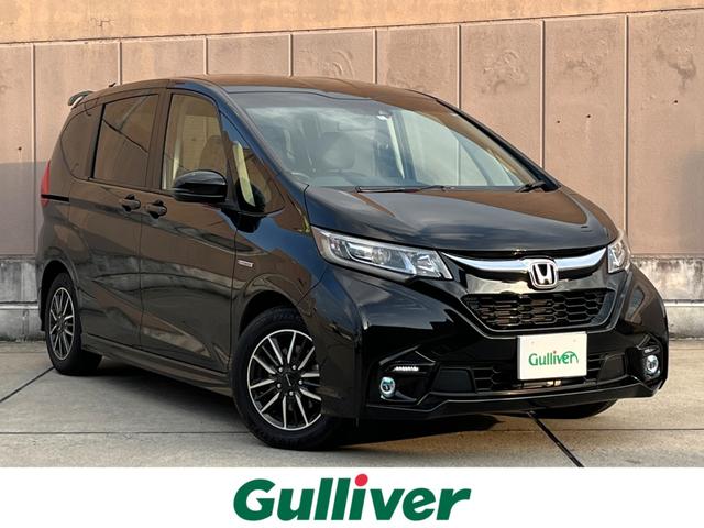 フリードハイブリッド ホンダ ハイブリッド モデューロｘ ホンダセンシング ６人乗り 純正９型ナビ バックカメラ 両側パワースライドドア ハーフレザーシート レーダークルーズコントロール 衝突軽減ブレーキ レーンキープアシスト ビルトインｅｔｃ ｌｅｄライト ｃ