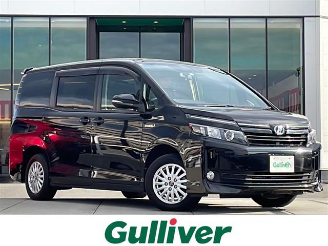 ヴォクシー トヨタ ハイブリッドｖ 禁煙車 純正９型ナビ フルセグｔｖ ｂｔ接続 純正後席モニター 天井スピーカー バックカメラ ｅｔｃ 両側電動 シートヒーター 置くだけ充電 クルコン ｌｅｄヘッドライト 純正１５ａｗ アイドリング 新潟県 ハイブリッドｖ 禁煙車