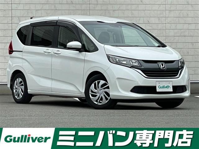 フリード Ｇ・ホンダセンシング　社外８型ＳＤナビ（フルセグＴＶ／ＢＴ／ＤＶＤ／ＣＤ）　禁煙車　バックモニター　ホンダセンシング　両側電動スライドドア　レーダークルーズコントロール　ＥＴＣ　スマートキー　スペアキー　社外フロアマット（1枚目）