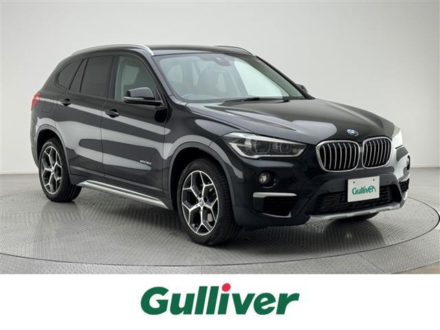 Ｘ１ ｘＤｒｉｖｅ　１８ｄ　ｘライン　純正ナビ（Ｂｌｕｅｔｏｏｔｈ／ＣＤ／ＤＶＤ／ＵＳＢ）　バックカメラ　ＥＴＣ　レザーシート　パワーシート　シートヒーター　社外フロアマット　純正アルミホイール　オートライト　ＬＥＤヘッドライト（1枚目）