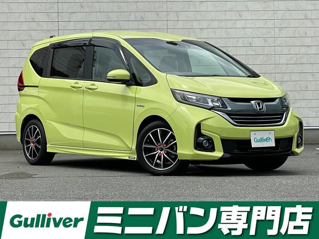 ハイブリッド・Ｇホンダセンシング　禁煙車　純正９型ＳＤナビ（フルセグＴＶ／ＣＤ／ＤＶＤ／ＢＴ）バックモニター　ホンダセンシング　両側パワスラ　レーダークルコン　ＥＴＣ　純正ＬＥＤヘッドライト　フォグランプ　プッシュスタート(1枚目)