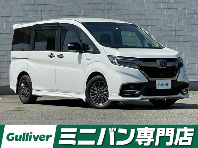 ハイブリッドモデューロＸ　ホンダセンシング　純正１０型メモリナビ（フルセグＴＶ／ＣＤ／ＤＶＤ／ＢＴ）バックモニター　ホンダセンシング　両側パワスラ　レーダークルコン　ドラレコ　ＥＴＣ　シートヒーター　ブレーキホールド　サイドビューサポートミラー(1枚目)