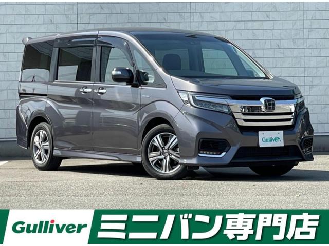 ホンダ ステップワゴンスパーダ スパーダハイブリッド　Ｇ・ＥＸ　ホンダセンシング　純正１０型メモリナビ（フルセグＴＶ／ＣＤ／ＤＶＤ／ＢＴ）バックモニター　ホンダセンシング　両側パワスラ　レーダークルコン　前後ドラレコ　ＥＴＣ　シートヒーター　ブレーキホールド　純正ＬＥＤヘッドライト