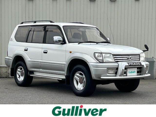 ランドクルーザープラド(トヨタ) ＴＸリミテッド　４ＷＤ　ＥＴＣ　３列シート　純正アルミホイール　純正フロアマット　スペアキー１本 中古車画像