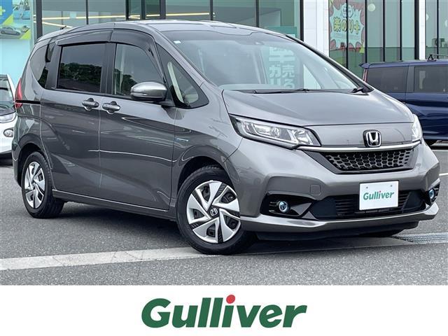 ハイブリッド・Ｇホンダセンシング　ワンオーナー　純正９インチナビ　ＤＶＤ／ＤＴＶ／Ｂｌｕｅｔｏｏｔｈ／ＵＳＢ　バックカメラ　レーダークルーズコントロール　両側パワースライドドア　ＬＥＤオートライト　純正ホイール付きスタッドレス積込