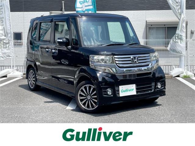 Ｎ－ＢＯＸカスタム Ｇ・ターボパッケージ　禁煙車　Ｓｔｒａｄｅ７インチＳＤナビ　バックカメラ　クルコン　両側パワースライドドア　ＡＵＴＯライト　パドルシフト　アイドリングストップ　ＥＴＣ　フルセグ　Ｂｌｕｅｔｏｏｔｈ　ＣＤ／ＤＶＤ（1枚目）