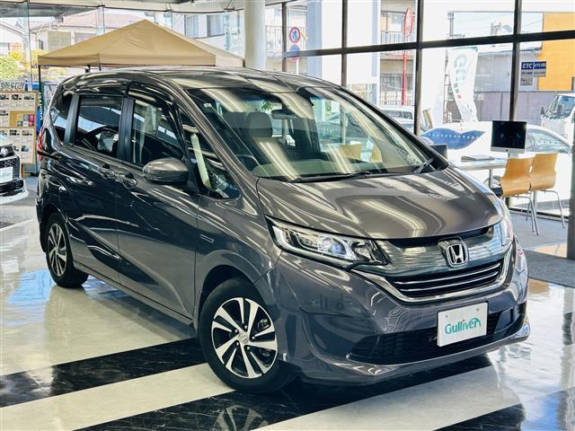 フリードハイブリッド ハイブリッド・EX LEDヘッドライト アクティブコーナリングライト Sパッケージ Cパッケージ コンフォートビューパッケージ 運転席&助手席シートヒーター 両側パワスラ 純正ナビ バックカメラ ETC 純正ドラレコ(1枚目)