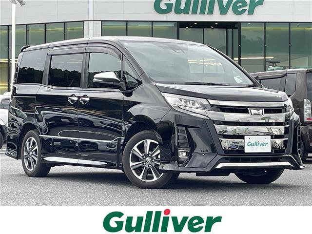 ノア Ｓｉ　ダブルバイビーＩＩＩ　社外ナビ／フルセグテレビ／ＡＭ／ＦＭ／ＣＤ／Ｂｌｕｅｔｏｏｔｈ／オートハイビーム／クルーズコントロール／レーンアシスト／コーナーセンサー／両側パワスラ／ＥＴＣ／横滑り防止装置／電動格納ミラー（1枚目）