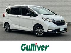 フリード+ハイブリッド ハイブリッド・クロスターホンダセンシング 純正9型ナビ バックカメラ 衝突被害軽減システム レーンキープアシスト コーナーセンサー クルーズコントロール 純正アルミホイール 純正フロアマット ルーフレール 前後ドライブレコーダー ETC 中古車画像