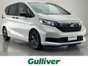 フリードハイブリッド ハイブリッド・Ｇブラックスタイル　純正９型ナビ　両側パワスラ　追従クルコン　禁煙車　フルセグＴＶ　ＤＶＤ　ホンダセンシング　ＥＴＣ　バックカメラ　シートヒーター　衝突軽減　コーナーセンサー　ＬＥＤライト　純正マット　ロールサンシェード（1枚目）