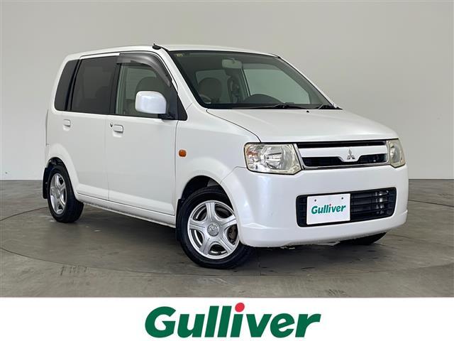 ｅＫワゴン ＧＳ　・ＣＤデッキ・片側パワースライドドア・社外１３インチアルミホイール・ヘッドライトレベライザー・電動格納ミラー・フロアマット・パワーウインドウ・ハロゲンライト・リモコンキー・フロアマット・取扱説明書（1枚目）