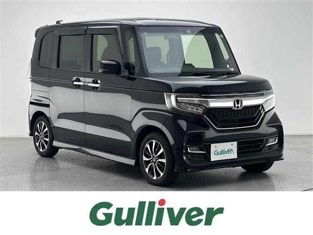 Ｎ－ＢＯＸ Ｇ・Ｌホンダセンシング　社外ナビバックカメラビルドインＥＴＣ片側パワスラ純正１４インチアルミホイール衝突軽減ブレーキレーンキープアシスト追従クルコンオートライトオートハイビームＬＥＤヘッドライトスマートキープッシュスタート（1枚目）