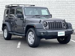 ジープ・ラングラーアンリミテッド スポーツ 社外ナビ ETC バックカメラ Bluetooth CD DVD フルセグ サンルーフ LEDヘッドライト ABS 横滑り防止 背面タイヤ ルーフキャリア 純正アルミホイール 純正フロアマット 中古車画像