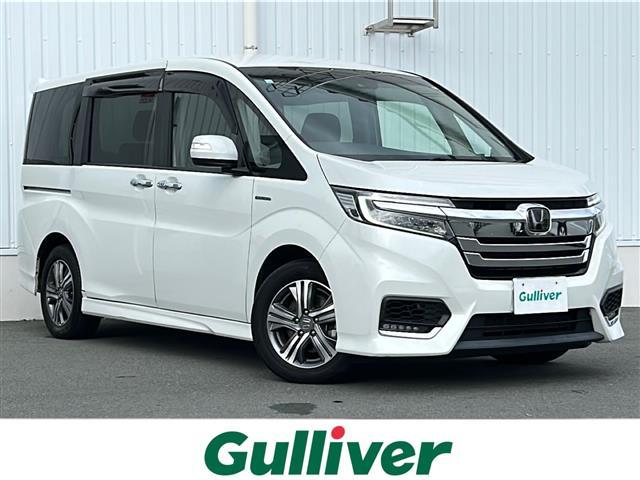 ステップワゴンスパーダ スパーダハイブリッド　Ｇ　ホンダセンシング　純正ナビ　バックカメラ　純正フリップダウンモニター　ビルトインＥＴＣ　両側電動　前方ドラレコ　　コーナーセンサー　スペアキー　ＵＳＢ給電　レーダークルーズコントロール　ＬＥＤ　ウォークスルー　禁煙車（1枚目）