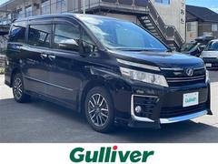 ヴォクシー ZS 煌 社外ディスプレイオーディオ フルセグTV DVD再生 Bluetooth ETC バックカメラ 両側パワスラ レーンアシスト衝突軽減ブレーキ スマートキー プッシュスタート 純正LEDヘッドライト 中古車画像