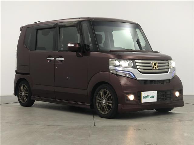 Ｎ−ＢＯＸカスタム(ホンダ) Ｇ・Ｌパッケージ　ナビ　バックカメラ　オートエアコン　パワスラ　スマートキー　ステアリングスイッチ　オートライト　ＨＩＤライト　フォグ　アルミホイール　電格ミラー　フロアマット　電格ミラー 中古車画像