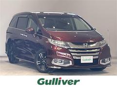 オデッセイハイブリッド ハイブリッド ホンダセンシング/ステアリングスイッチ/純正ナビ/全方位カメラ/革巻きステアリング/両側パワースライドドア/プッシュスタート/LEDヘッドライト/純正フロアマット/純正アルミホイール/後席モニター 中古車画像