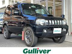 ジムニー ワイルドウインド ロッソモデロマフラー・社外ナビ・ターボ・4WD・前後ドラレコ・ETC・シートヒーター・背面タイヤ 中古車画像