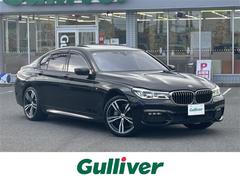 7シリーズ 740i Mスポーツ 正規ディーラー車/メーカーHDDナビ/バックカメラ/全周囲カメラ/サンルーフ/純正20インチアルミ/パワーバックドア/イージークローザー/ハーマンカードン//エアサス車/黒革ナッパレザー/保証書 中古車画像