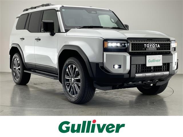 ランドクルーザー250(トヨタ) ZX 純正12.3型ナビ Grgoセキュリティ ムーンルーフ JBL デジイン 茶革 全方位カメラ ヒッチメンバー ETC2.0 ベンチレーション BSM ワイヤレス充電 HDMI トヨタチームメイト 禁煙 中古車画像