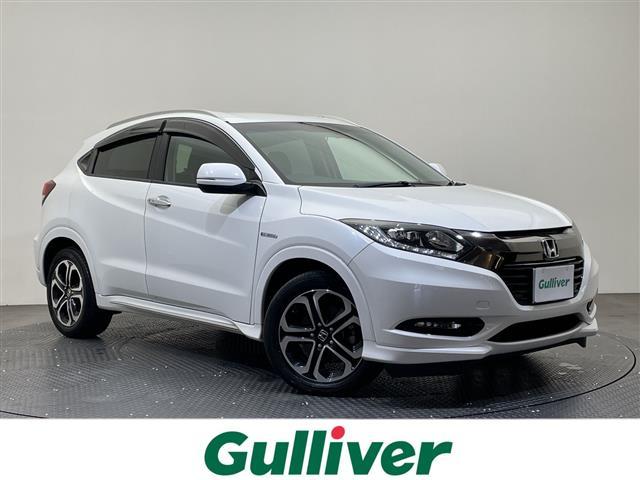 ヴェゼル(ホンダ) ハイブリッドZ・ホンダセンシング 純正ナビ/ワンセグ/Bluetooth/USB/バックカメラ/衝突被害軽減ブレーキ/クルーズコントロール/ETC/DN席シートヒーター/LEDヘッドライト/ハーフレザーシート/チップアップシート 中古車画像