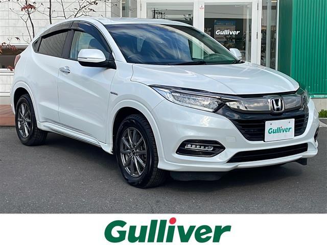 ヴェゼル(ホンダ) ハイブリッドZ・ホンダセンシング 4WD 寒冷地仕様 純正8型ナビ フルセグ Bカメラ 純正前後ドラレコ 純正エンジンスターター ハーフレザーシート 前席シートヒーター ETC パドルシフト 衝突軽減ブレーキ 追従クルコン LED 中古車画像