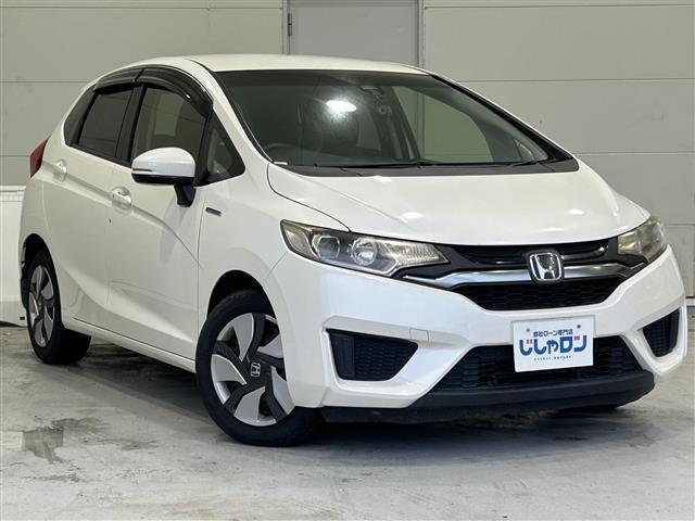 沖縄県の中古車ならフィットハイブリッド Ｌパッケージ　本土仕入　フルセグＴＶ　ＥＴＣ　ナビ　ＤＶＤ再生　バックカメラ　ドライブレコーダー　プッシュスタート　ハーフレザーシート　クルーズコントロール　純正アルミホイール　オートライト　Ｂｌｕｅｔｏｏｔｈ接続