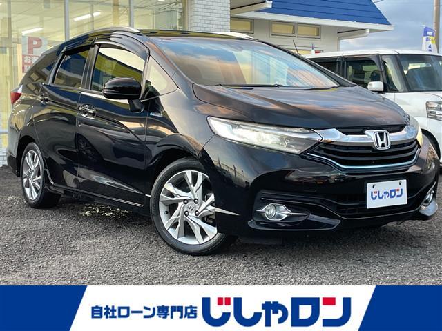 シャトル(ホンダ) ハイブリッドZ 衝突軽減被害軽減ブレーキ 純正ナビゲーション Bluetooth バックカメラ ハーフレザーシート LEDヘッドライト フォグランプ クルーズコントロール 室内LEDランプ パドルシフト 純正マット 中古車画像