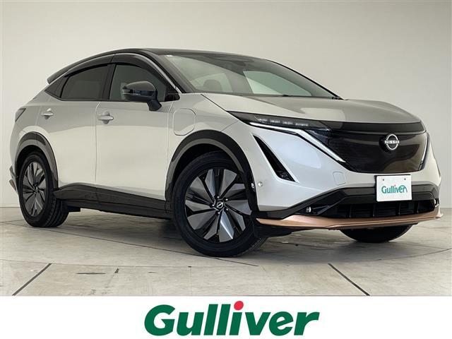 アリア(日産) B6 プロパイロット2.0 ダイナミックパッケージ ガラスルーフ 純正12.3型ディズプレイオーディオナビ 三眼LEDヘッドライト 全方位カメラ クルーズコントロール シートヒーター 電動リアゲート 中古車画像