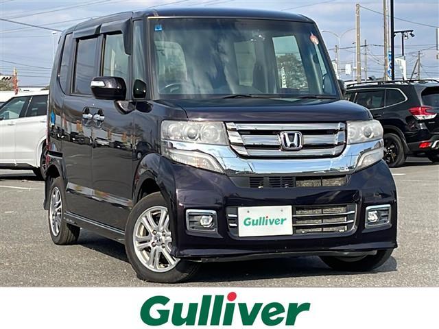 NBOXカスタム(ホンダ)G SSパッケージ 純正ディーラーOPナビ 横滑り防止装置 バックカメラ ビルトインETC ドライブレコーダー ECONモード 片側パワースライドドア 前席シートヒーター ステアリングリモコン プッシュスタート HID 中古車画像