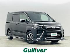 ヴォクシー ZS 煌III トヨタセーフティセンス アルパイン製8インチメモリーナビ フルセグTV/CD/DVD/BT/HDMI/AM/FMアルパイン製フリップダウンモニター TRDエアロ ETC 前後ドラレコ 純正AW 中古車画像