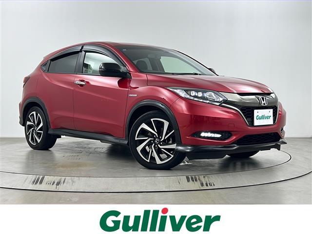 ヴェゼル(ホンダ) ハイブリッドRS・ホンダセンシング 純正ナビ バックカメラ ETC 追従式クルーズコントロール 衝突軽減ブレーキ 車線逸脱警報 電子パーキングシステム ブレーキホールド パドルシフト アルミペダル 純正フロアマット 純正ドアバイザー 中古車画像