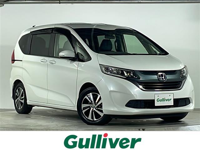 フリード(ホンダ) G・ホンダセンシング 禁煙 純正ナビ バックカメラ Sパケ Cパッケージ LEDヘッドライト アクティブコーナリングライト コンフォートビューパッケージ 両側パワースライドドア ハーフレザー 革巻きステアリング ETC 中古車画像