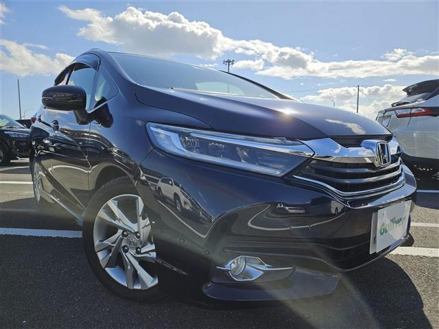 シャトル(ホンダ) ハイブリッドZ ストラーダナビ フルセグ バックカメラ ETC クルコン シティブレーキアクティブシステム オートライト 革巻きステアリング パドルシフト シートヒーター シルバールーフレール 禁煙車 中古車画像