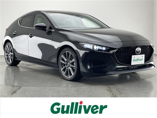 MAZDA3ファストバック(マツダ) 20S Lパッケージ 純正ナビ フルセグTV 全方位カメラ 禁煙 DVD 黒革 シートヒーター 前後ドラレコ BSM HUD USB HDMI 衝突軽減 追従クルコン コーナーセンサー LEDオートライト ハンドルヒーター 中古車画像