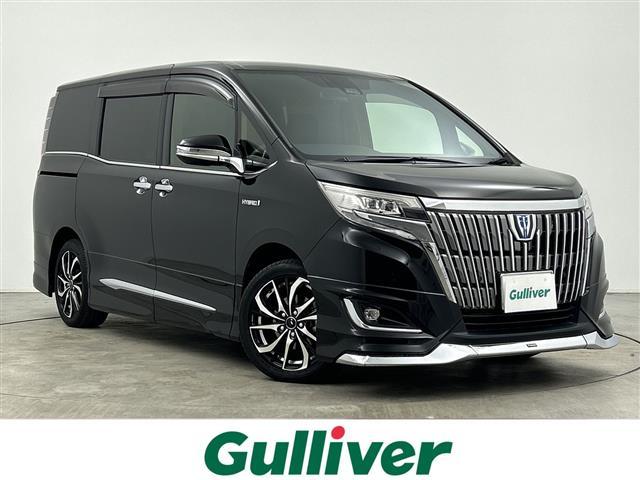 エスクァイア(トヨタ) ハイブリッドＸｉ　純正ＳＤナビ／フルセグＴＶ／バックカメラ／片側パワースライドドア／クルーズコントロール／シートヒーター／クリアランスソナー／オートハイビーム／ビルトインＥＴＣ／ＬＥＤヘッドライト／電動格納ミラー 中古車画像