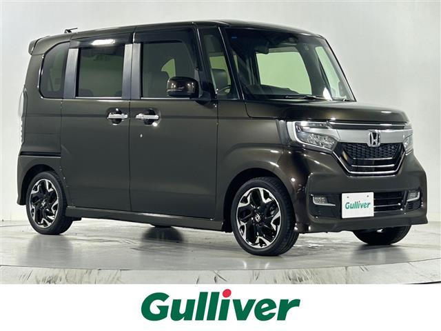 N−BOXカスタム(ホンダ) G・Lターボホンダセンシング 純正8インチナビ フルセグ Bluetooth バックカメラ 両側パワースライドドア 純正11.6インチフリップダウンモニター ビルトインETC 純正ドライブレコーダー ホンダセンシング 純正15AW 中古車画像