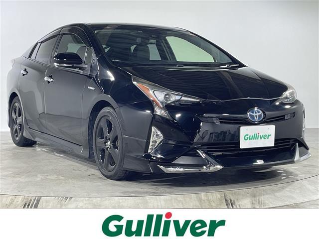 プリウス(トヨタ) Aツーリングセレクション 純正ナビ エアロパーツ(モデリスタ) 追従クルコン シートヒーター【D+N】 HUD パーキングアシスト 自動駐車 バックカメラ ワンセグTV AM/FM AUX ビルトインETC 社外フロアマット 中古車画像