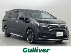 オデッセイハイブリッド e:HEVアブソルート 純正10インチナビ フリップダウンモニター アラウンドビューモニター 両側パワースライド 衝突被害軽減ブレーキ LEDヘッドライト フルセグTV 前後ドラレコ 純正フルエアロ Bluetooth 中古車画像