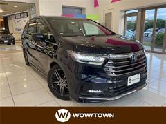 オデッセイハイブリッド e:HEVアブソルート・EX ホンダセンシング フリップダウンモニター 純正10インチSDナビ 全方位カメラ 両側パワースライドドア パワーバックドア レーダークルーズコントロール ハーフレザーシート パワーシート 中古車画像