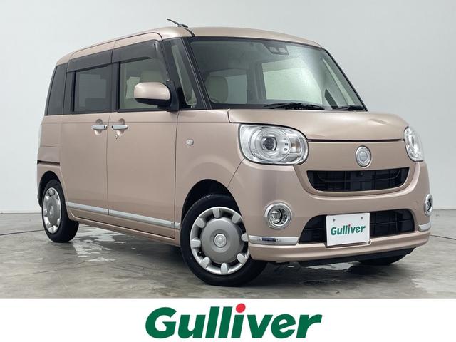 ムーヴキャンバス(ダイハツ) Ｇメイクアップリミテッド　ＳＡＩＩＩ　禁煙車／Aftermarketナビ／ワンセグＴＶ／全方位カメラ／両側パワースライドドア／スマートアシスト／ＥＴＣ／革調シートカバー／ステアリングスイッチ／オートハイビーム／コーナーセンサー／ 中古車画像