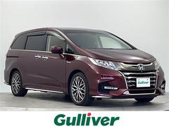 オデッセイハイブリッド ハイブリッドアブソルート・EXホンダセンシング 純正ナビ 後席フリップダウンモニター ブラインドスポットモニター 全方位カメラ 追従クルーズコントロール 両側パワースライドドア ハーフレザーシート シートヒーター フルセグTV コーナーセンサー 中古車画像