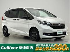 フリード Gブラックスタイル 禁煙車/純正9インチナビ/バックカメラ/ETC/前後ドラレコ/両側パワースライドドア/シートヒーター/LEDヘッドライト/ステアリングスイッチ/追従クルーズコントロール/レーンキープアシスト 中古車画像