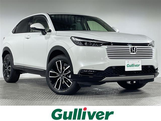 ヴェゼル(ホンダ) ｅ：ＨＥＶ　Ｚ　登録済未使用車　純正ＤＡ　バックカメラ　電動リアゲート　置くだけ充電　ハーフレザーシート　シートヒーター　ビルトインＥＴＣ２．０　電動パーキングブレーキ　オートホールド　ダウンヒルアシストコントロール 中古車画像