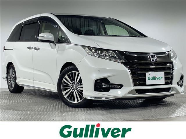 オデッセイ(ホンダ) アブソルート・ＥＸホンダセンシング　ホンダセンシング　純正８型ナビ　全方位カメラ　パーキングアシスト　両側電動スライドドア　シートヒーター　パワーシート　オットマン　ビルトインＥＴＣ２．０　前後ドライブレコーダー　パドルシフト　ＬＥＤ 中古車画像