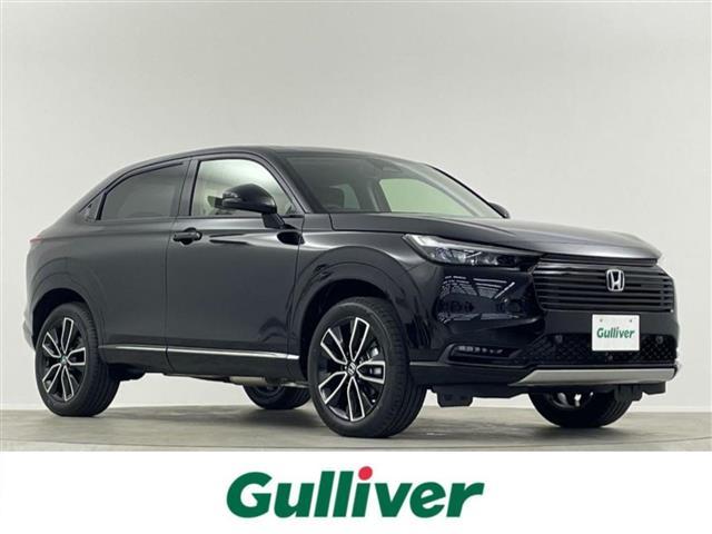 ヴェゼル(ホンダ) ｅ：ＨＥＶ　Ｚ　登録済未使用車　純正９型ＤＡ　ＴＶ　ＥＴＣ２．０　ＢＳＭ　コネクトナビ　Ｂカメラ　ワイヤレス充電　電動リアゲート　シートヒーター　ハーフレザーシート　ダウンヒルアシスト　ハンドルヒーター　ＢＴ 中古車画像