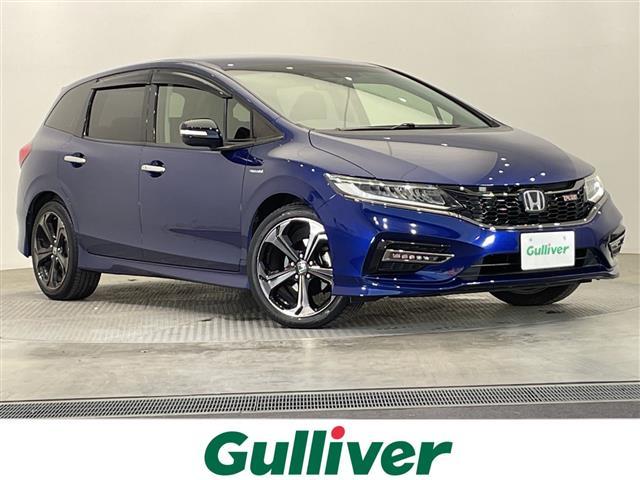 ジェイド(ホンダ) ハイブリッドＲＳ・ホンダセンシング　純正ナビ　フルセグＴＶ　Ｂｌｕｅｔｏｏｔｈ　ＡｐｐｌｅＣａｒＰｌａｙ　ＥＴＣ　ドライブレコーダー　パドルシフト　禁煙車　ＬＥＤライト　オートライト　ハーフレザーシート　ウィンカーミラー　フロアマット 中古車画像