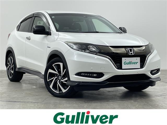 ヴェゼル(ホンダ) ハイブリッドＲＳ・ホンダセンシング　純正８型ナビ　追従クルーズコントロール　バックカメラ　レーンキープアシスト　プリクラッシュ　前席シートヒーター　ハーフレザーシート　前後ドラレコ　コーナーセンサー　横滑り防止　ＥＴＣ　禁煙車 中古車画像